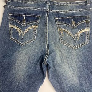 VANILLA STAR  women's Jeans. Size 10 slight boot cut leg. Original belt.